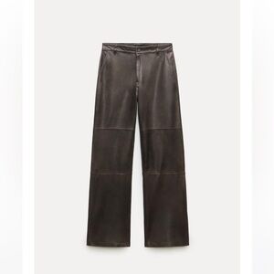 Brown leather pants.